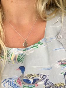 Porth customer wearing a seaglass necklace
