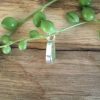 Lime Green Seaglass Necklace beachcombed in Portscatho. Side view of silver setting.